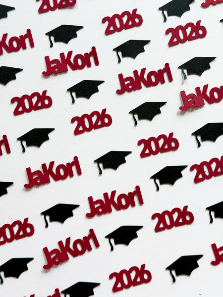 Maroon custom Class of 2026 confetti with name JaKori, matching year pieces and black graduation caps